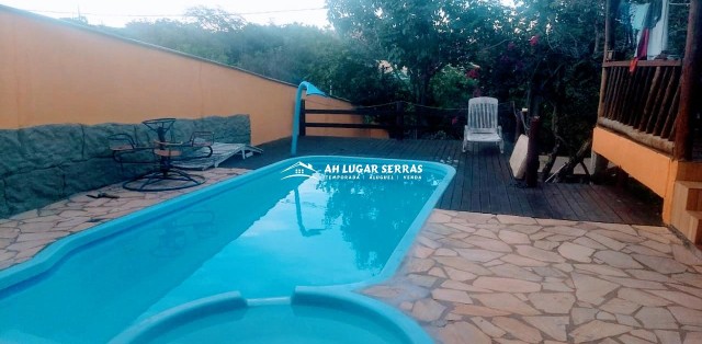 ACONCHEGANTE CASA COM PISCINA NO CENTRO DA SERRA DO CIPÓ